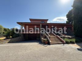  (unifamiliar aïllada), 703 m²